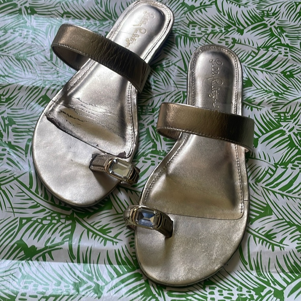 Lilly Pulitzer gold sandals with loop for big toe large rhinestones.